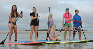 Surfing Lessons in Queensland with the family with Enviro Reef Paddle and Surf